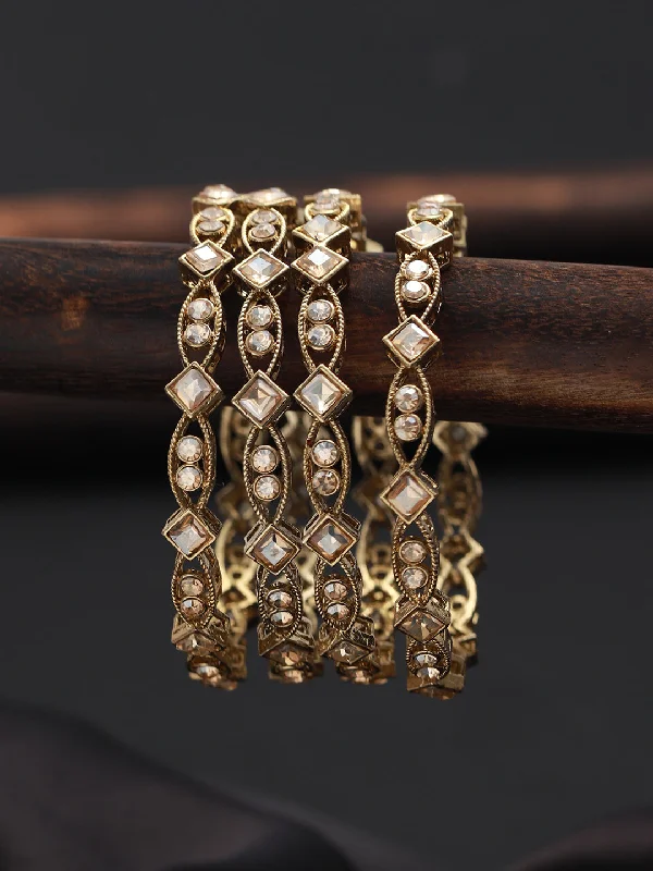 Unique Gold Wedding Bangles-Jazz And Sizzle Set Of 4 Gold-Plated Pearl & Kundan Studded Bangles